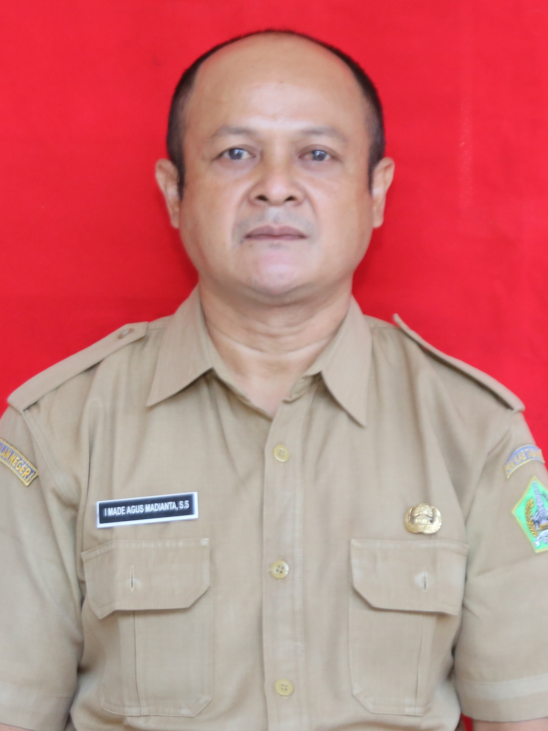 <center>Guru<br>I Made Agus Madianta, SS<br>197208042014061002</center>